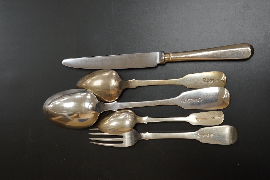 A harlequin part canteen of 19th century silver fiddle pattern flatware, comprising fifty four items, various dates and makers including twelve table spoons, twelve table forks and six dessert spoons with engraved initia